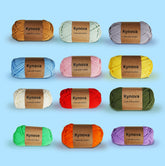 A collection of Kynova premium yarn skeins in various colors, labeled with the brand name and the fiber content information.