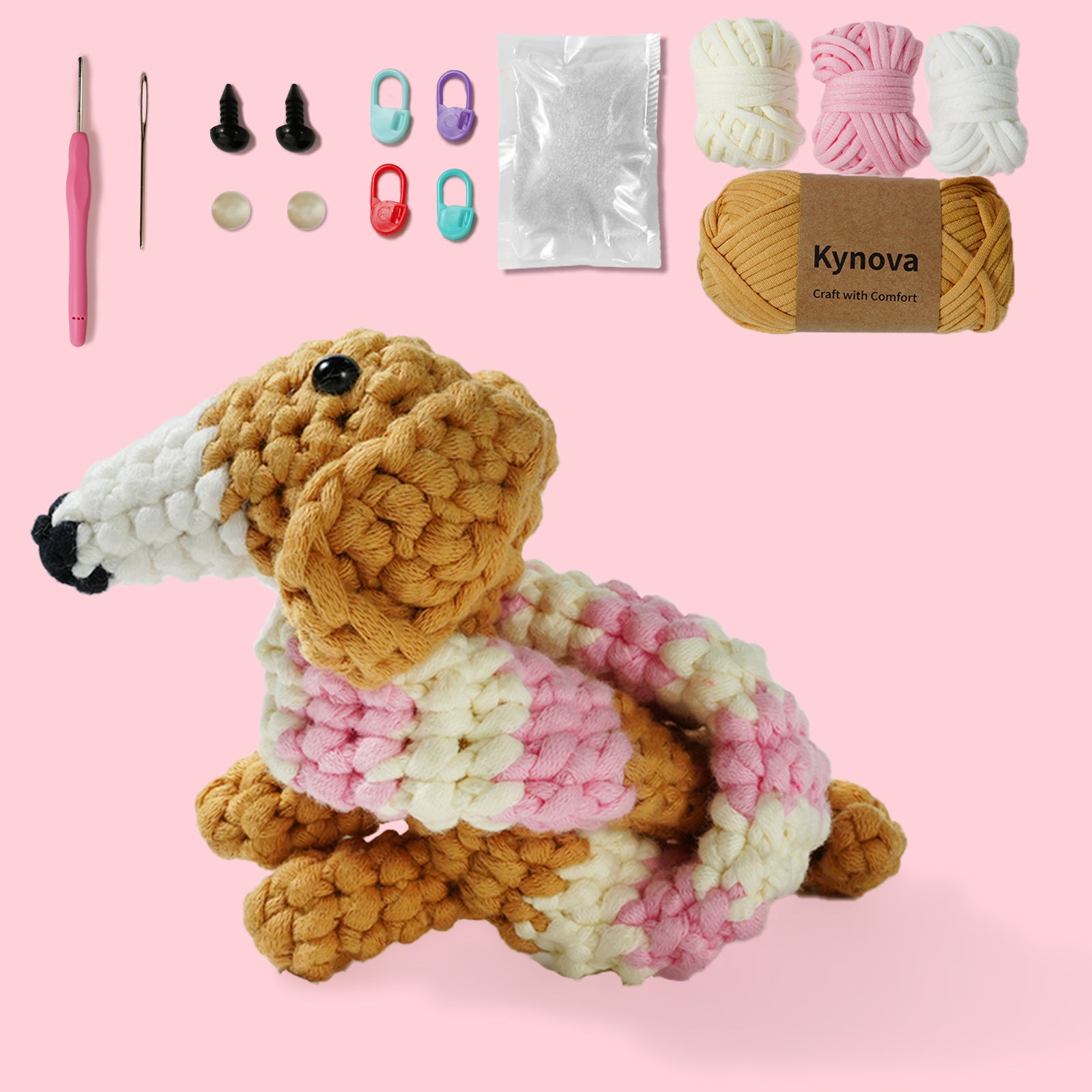 A crochet kit to create a long-neck dachshund, including yarn in various colors, crochet hooks, and other crafting supplies.