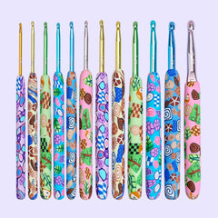 A set of 12 colorful crochet hooks with a cartoon pattern on the handles, arranged in a row with the hooks facing up.