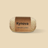 A skein of Kynova artificial raffia yarn in beige color, wrapped with a label that reads 'Kynova Craft with Comfort'.