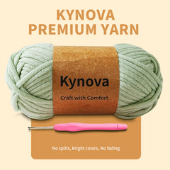 Kynova premium yarn with a pink crochet hook on a beige background