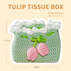 Crocheted tulip tissue box with dimensions on a beige background