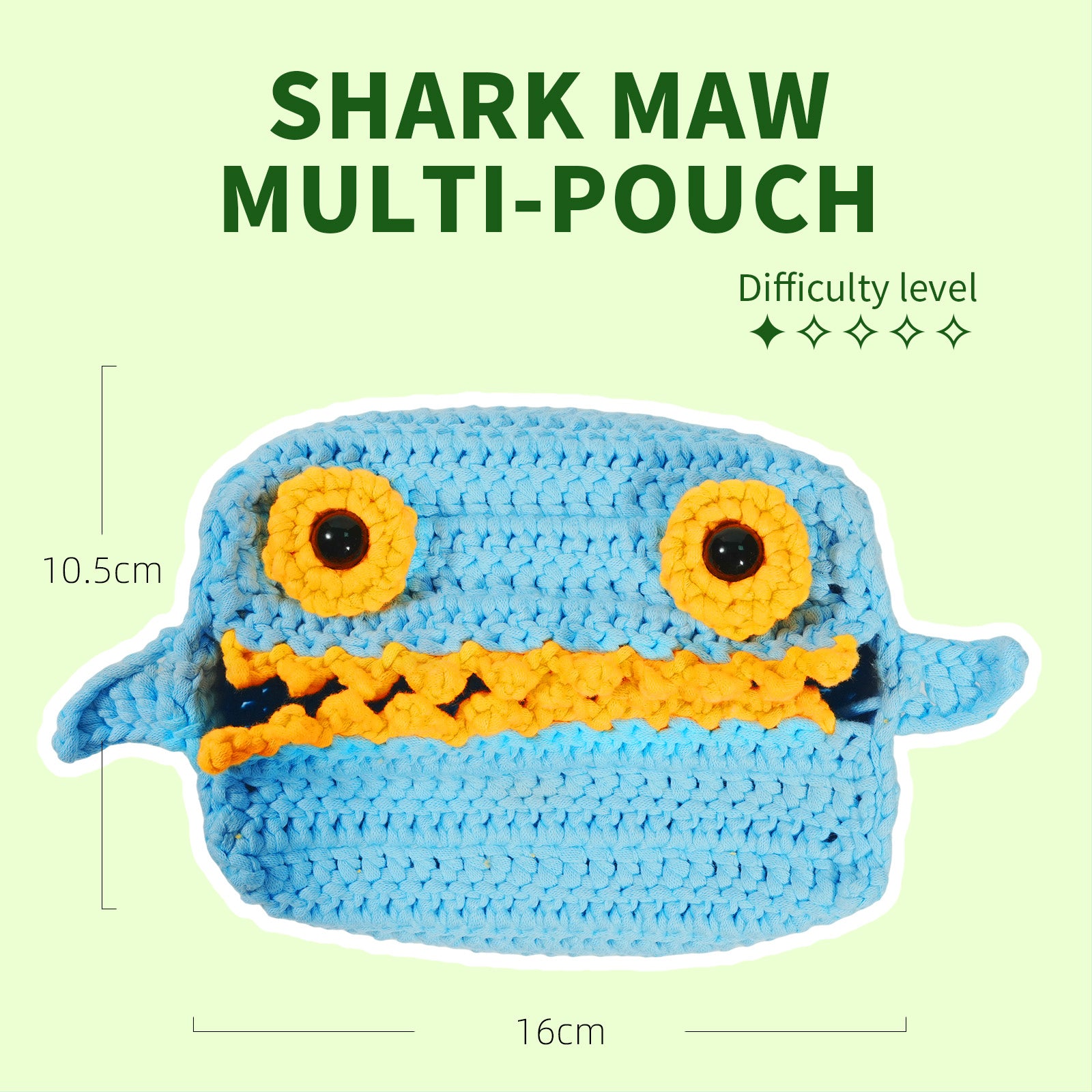 Crocheted shark-themed multi-pouch with measurements and difficulty level on a light green background